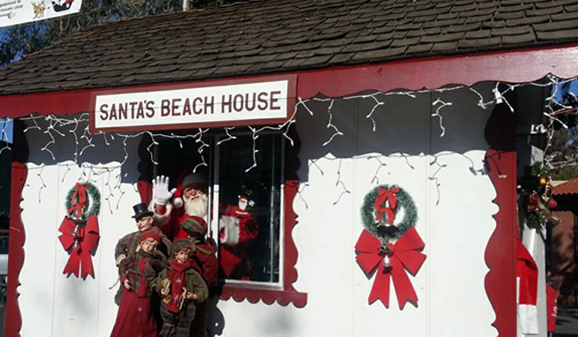 santa waving from a building entitled santas beach house