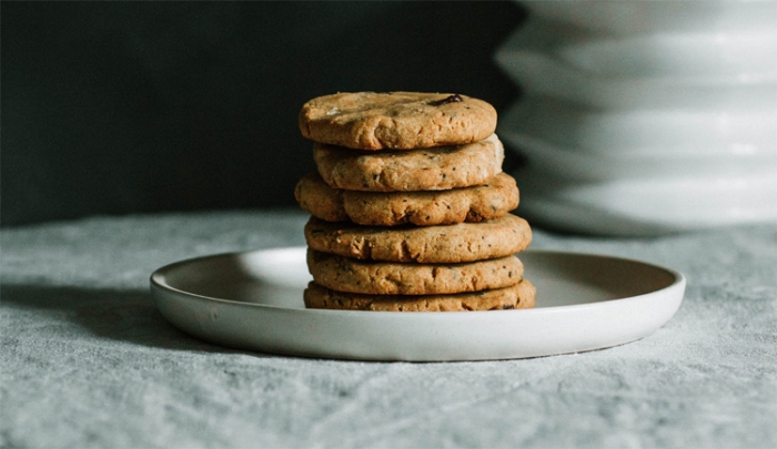 white plate with a pile of 6 cookies stacked
