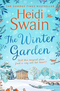 light blue book cover for The Winter Garden by Heidi Swain picturing a snow covered garden with a small bridge over a stream and a robin sitting on a branch. Heartwarming Christmas reads